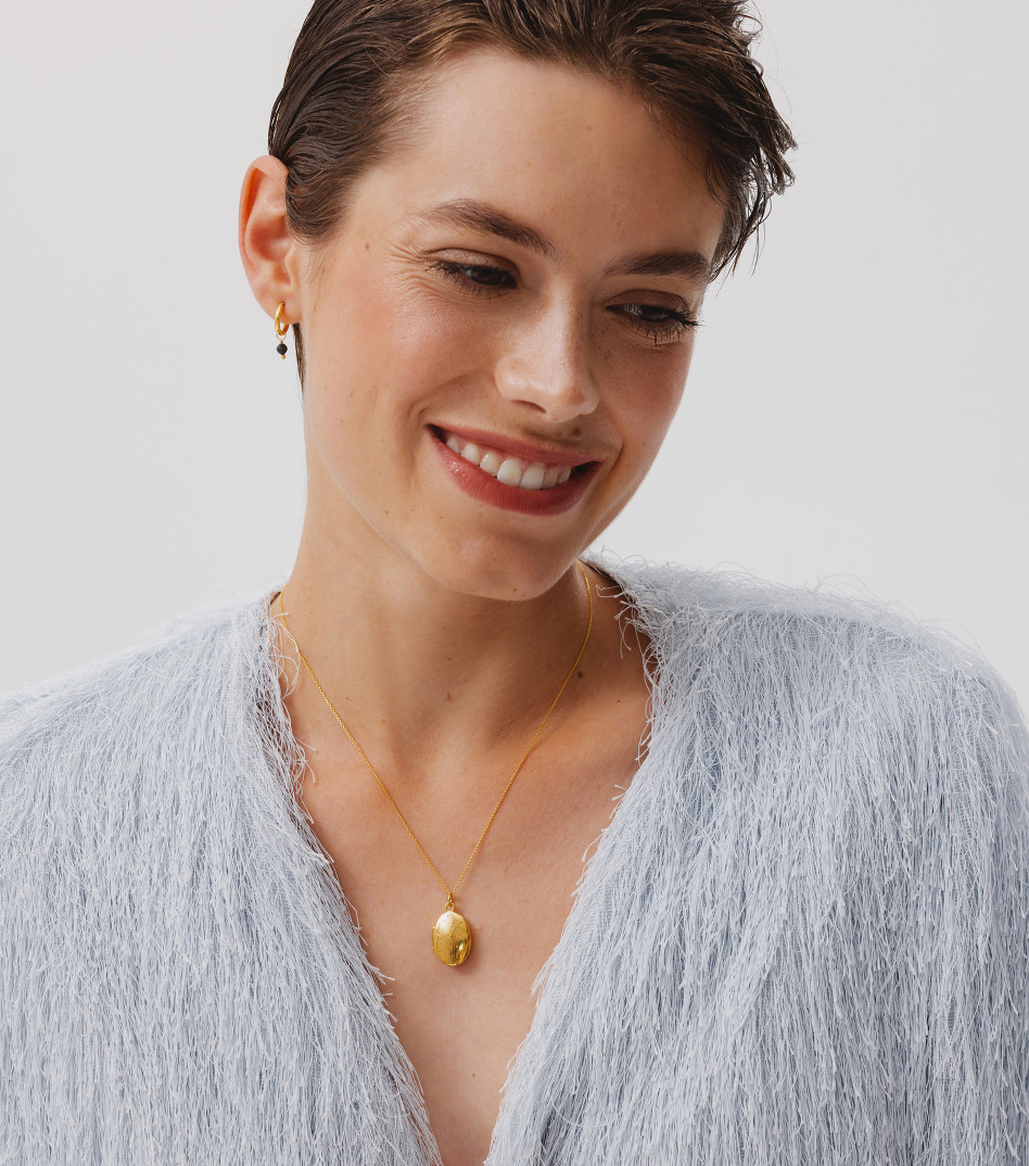 Pozłacany naszyjnik z otwieranym medalikiem