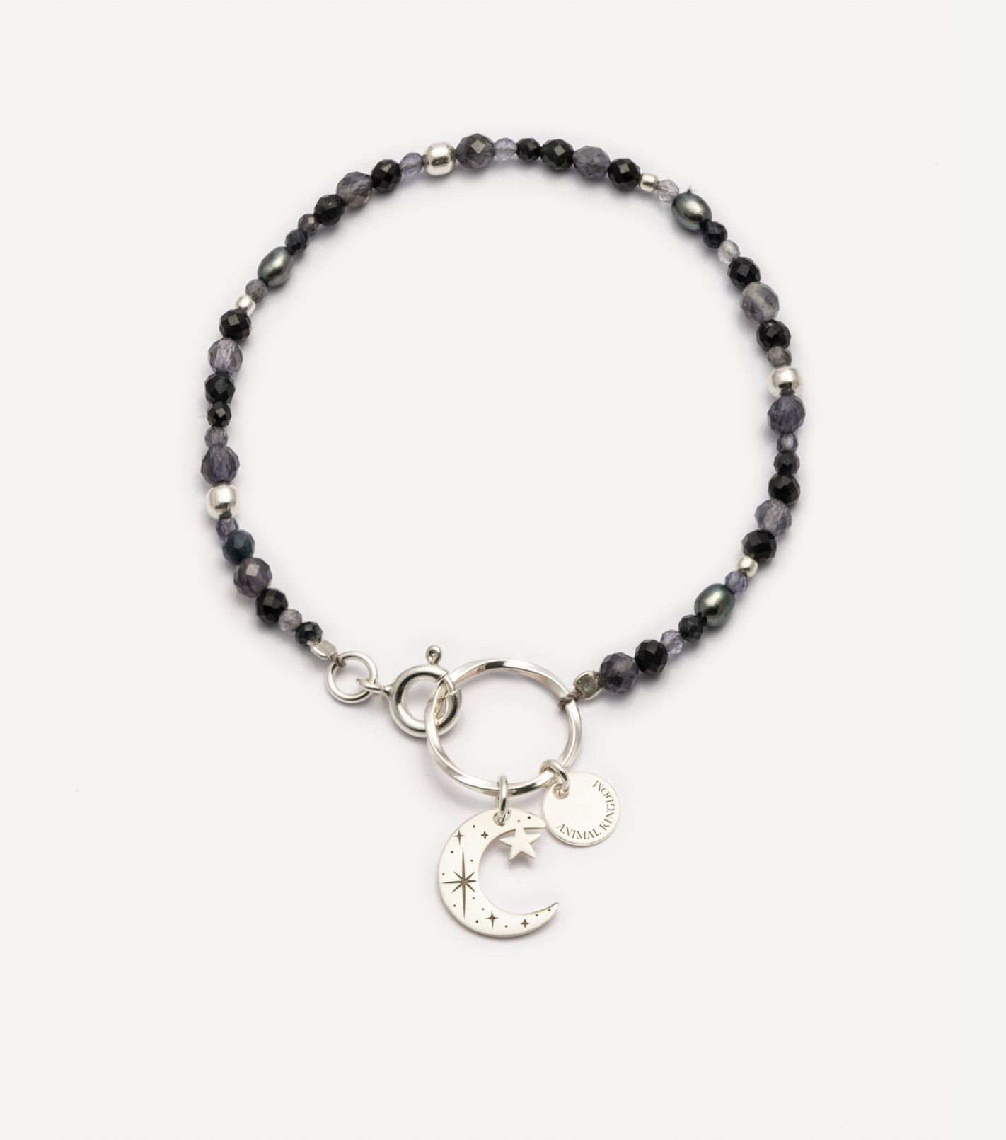 Srebrna bransoletka z kamieniami i zawieszką