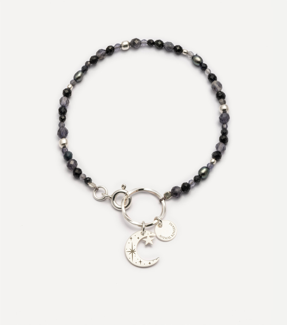 Srebrna bransoletka z kamieniami i zawieszką