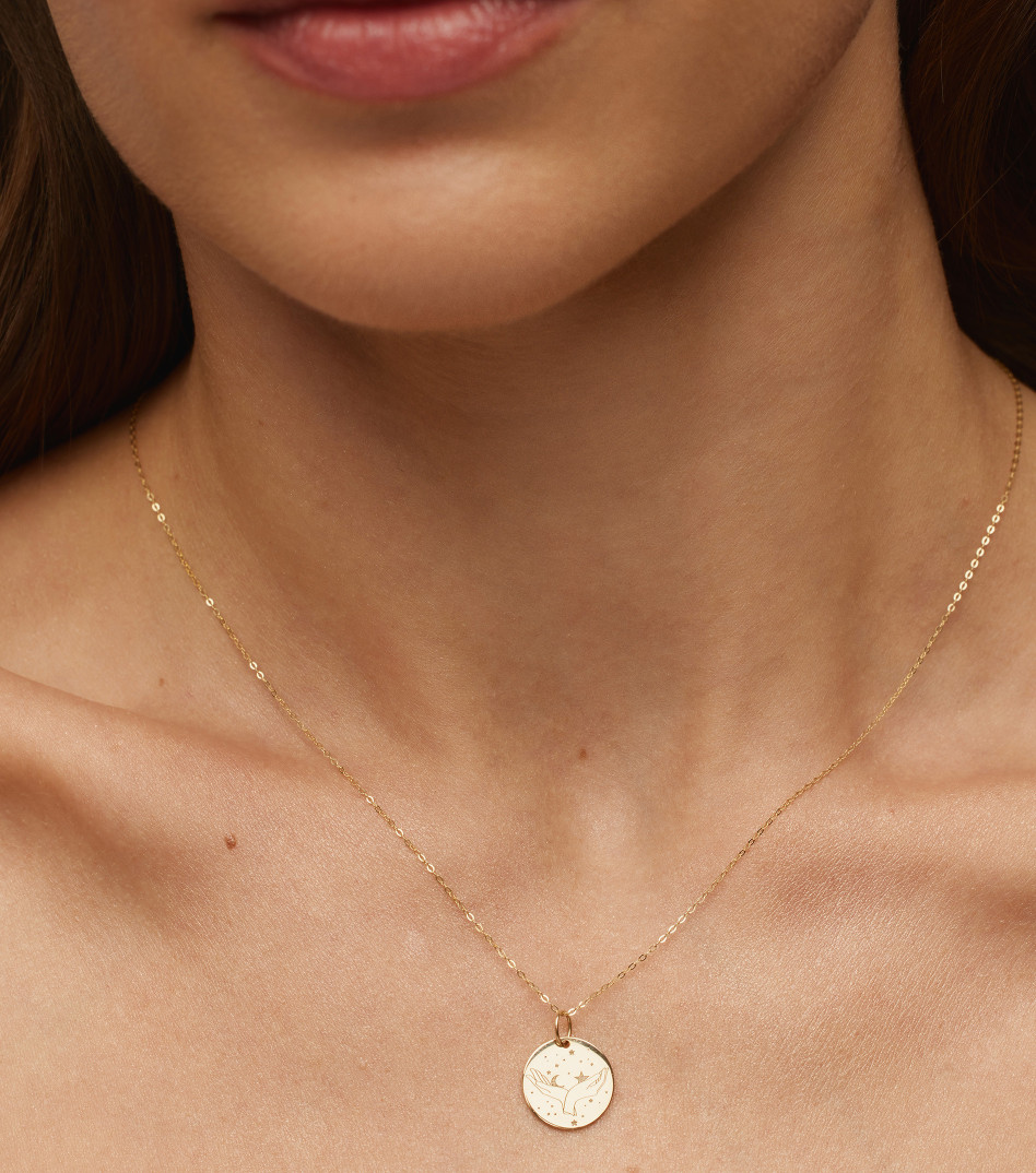 Złoty naszyjnik ze znakiem zodiaku