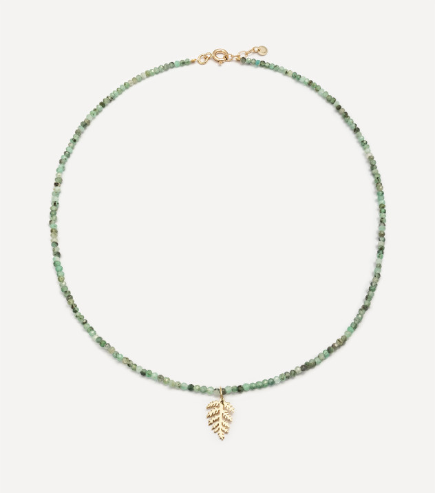 Złoty choker z kamieniami i zawieszką