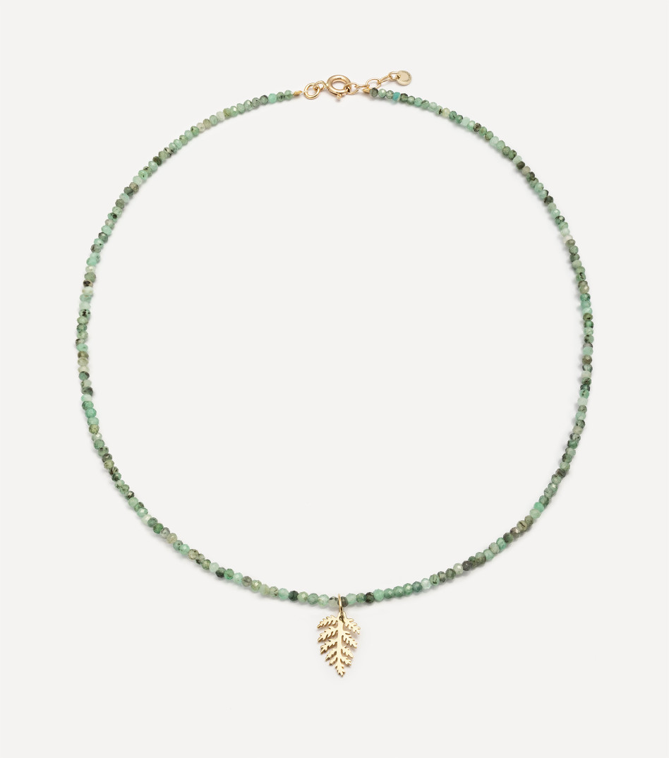 Złoty choker z kamieniami i zawieszką