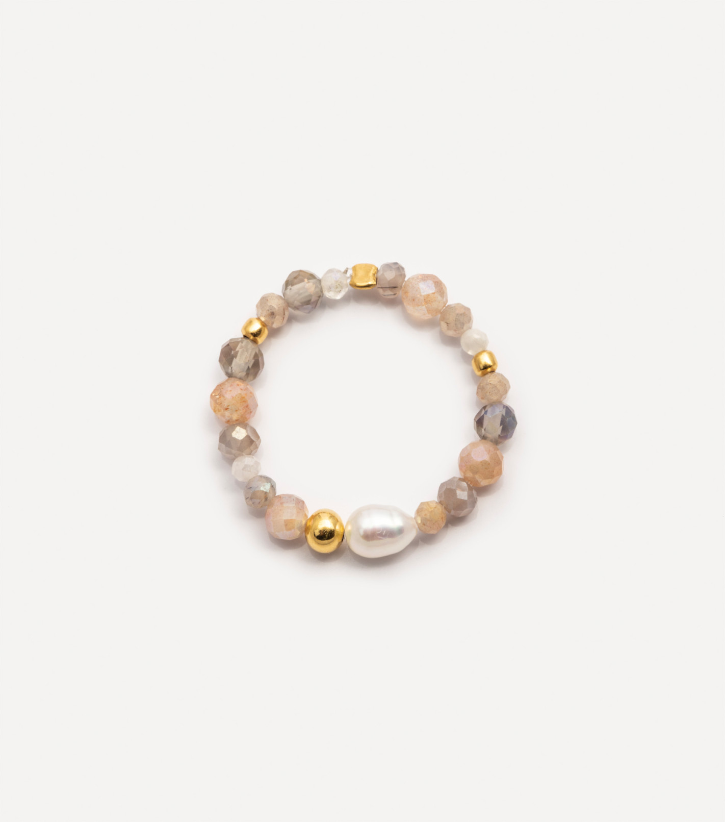 Pozłacany pierścionek z kamieniami