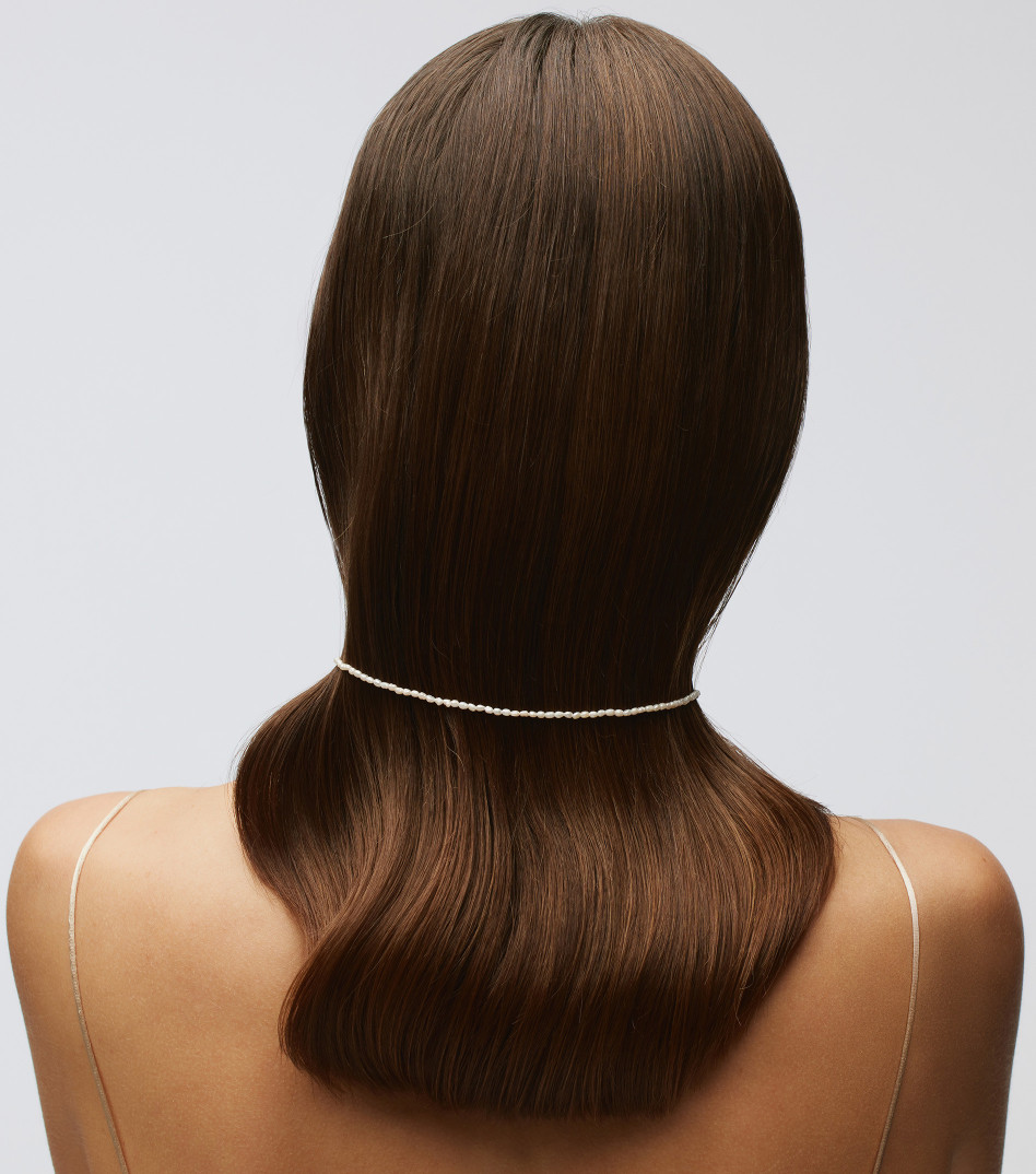 Złoty choker z kamieniami i zawieszką