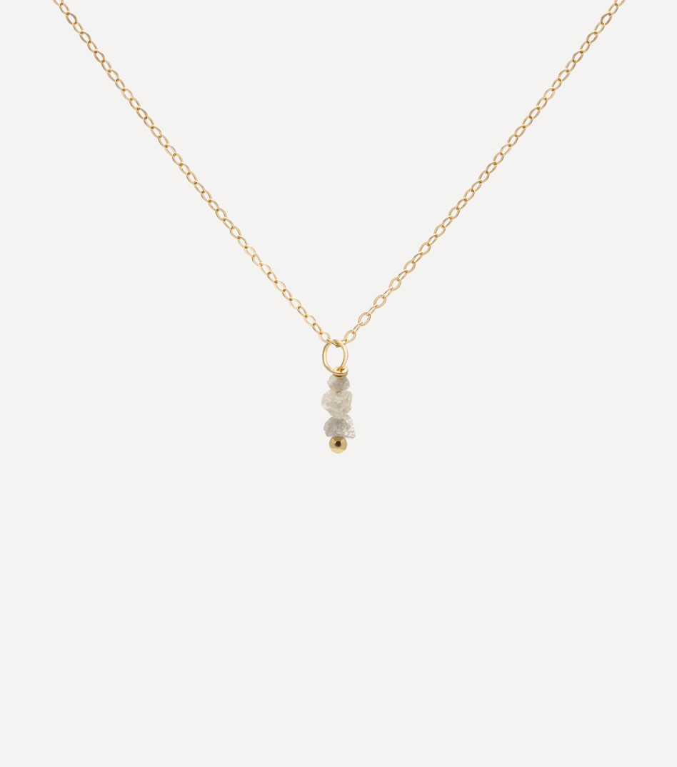 Złoty naszyjnik z zawieszką z surowych diamentów