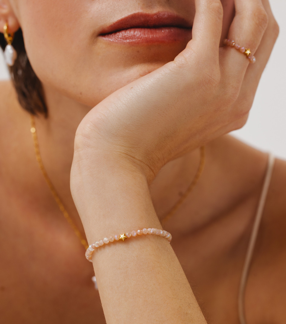 Pozłacana bransoletka z kamieniami i gwiazdką