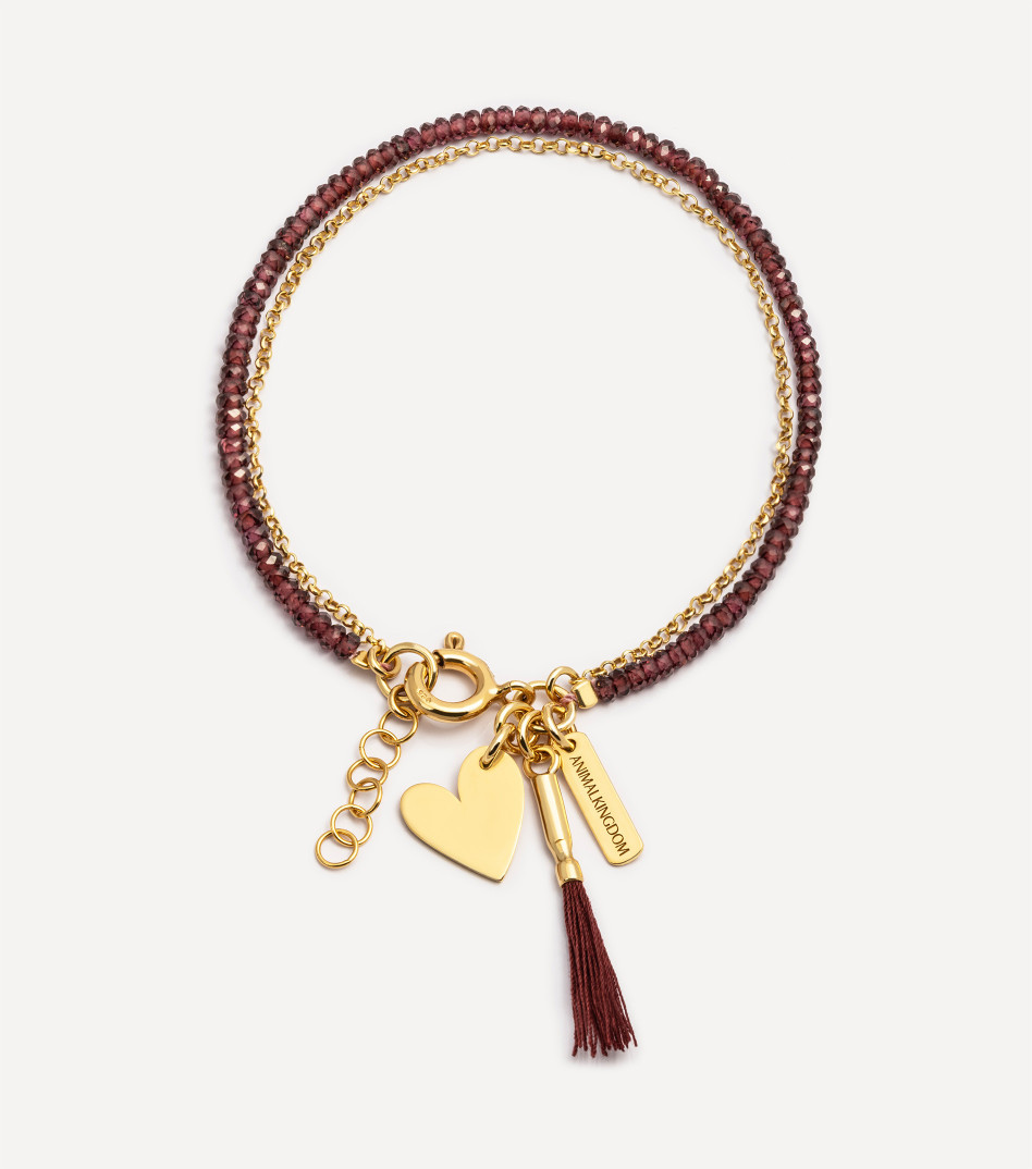 Pozłacana bransoletka z granatami i zawieszką