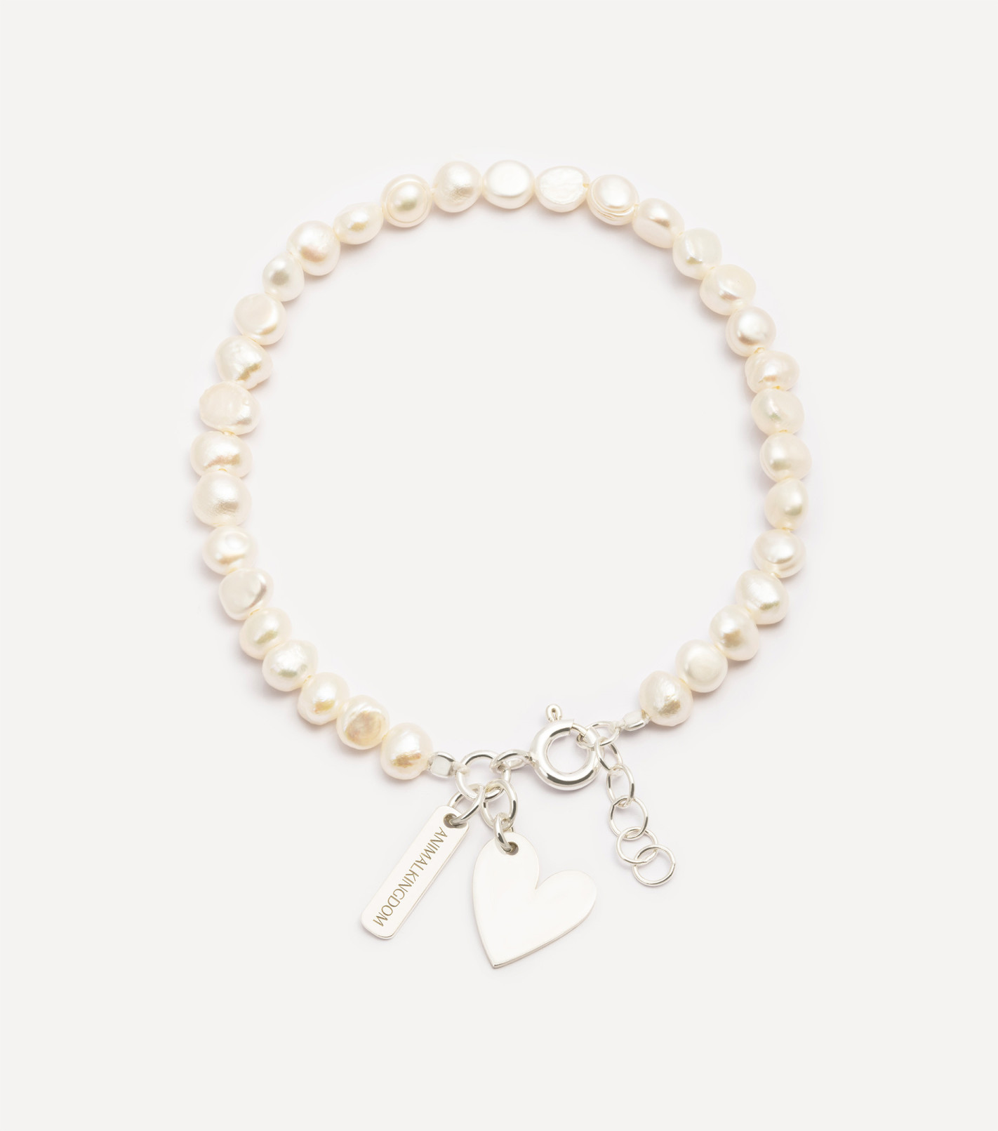 Srebrna bransoletka z perłami i zawieszką