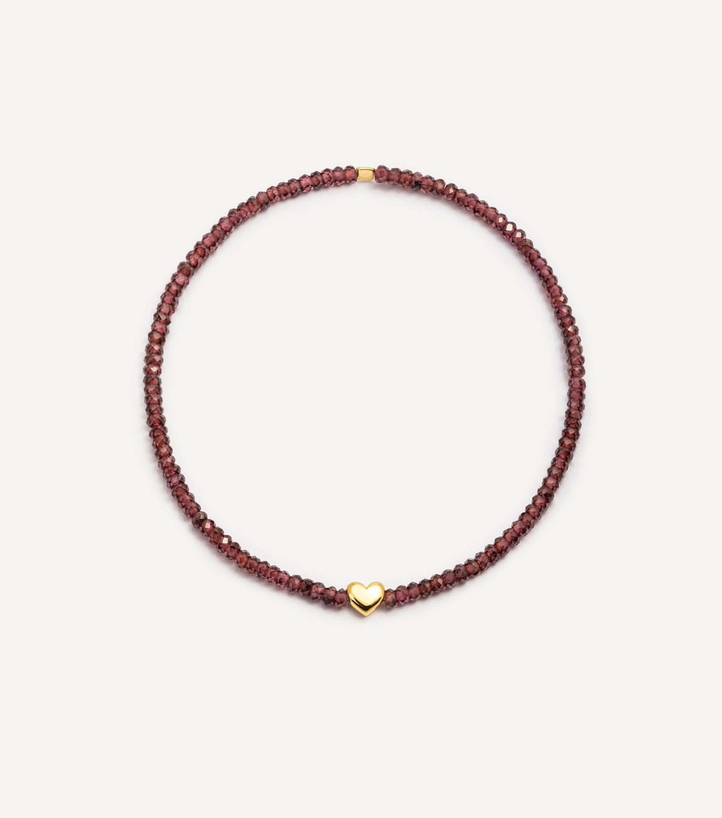 Pozłacana bransoletka z granatami i sercem