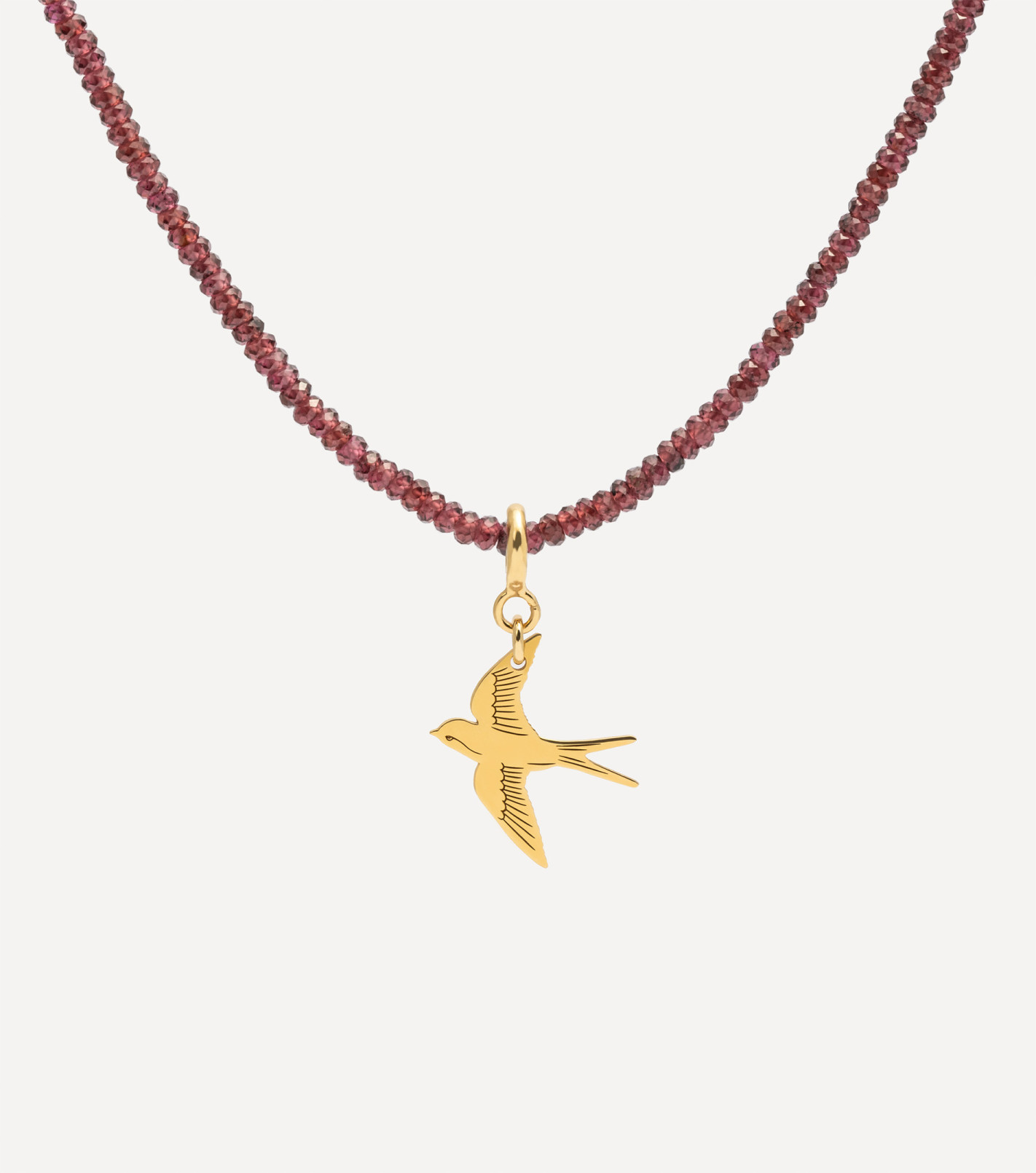 Pozłacany choker z kamieniami i zawieszką