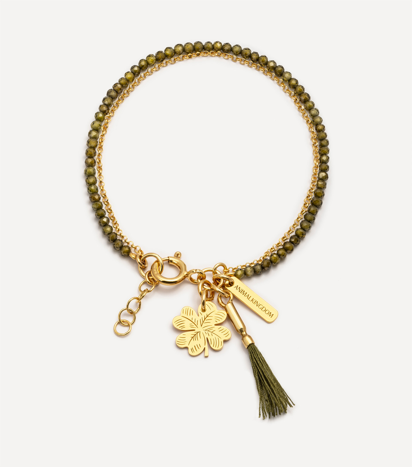 Pozłacana bransoletka z koniczyną i zielonymi kryształami