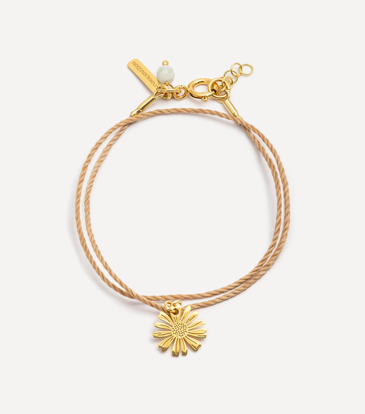 Pozłacana bransoletka na sznureczku z rumiankiem