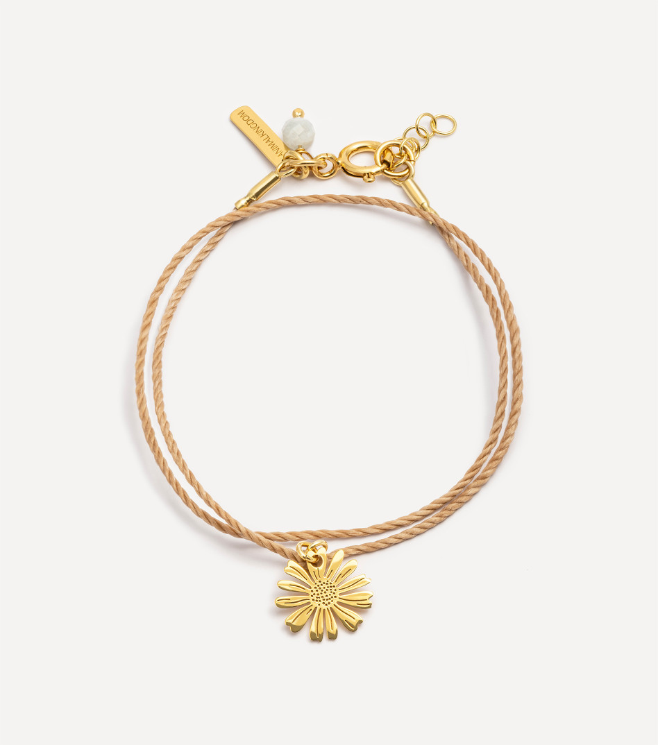 Pozłacana bransoletka na sznureczku z rumiankiem