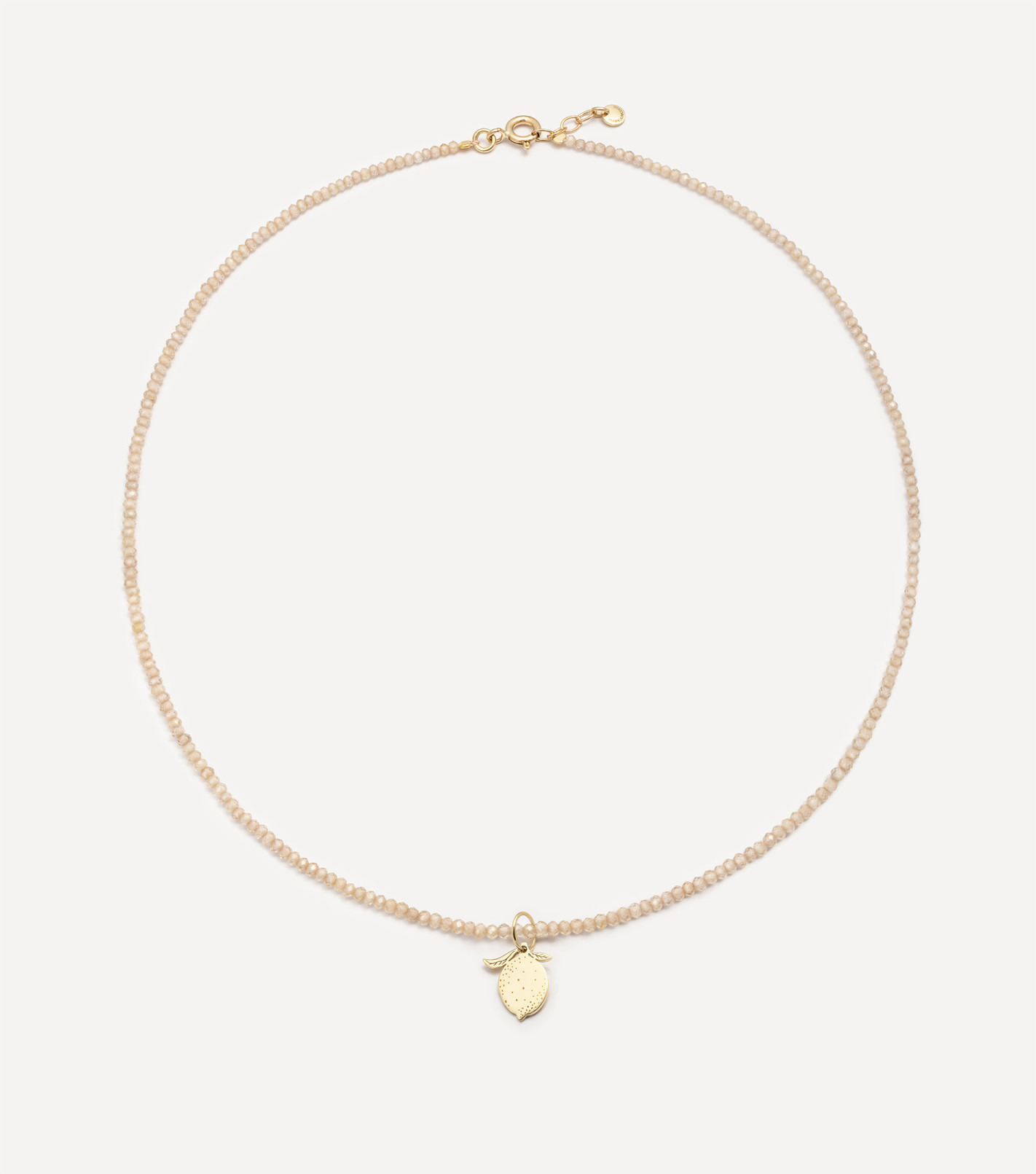 Złoty choker z kamieniami i zawieszką