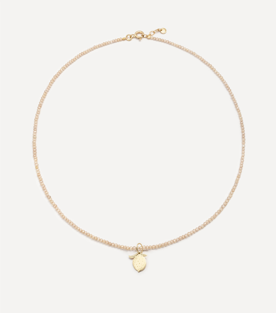 Złoty choker z kamieniami i zawieszką