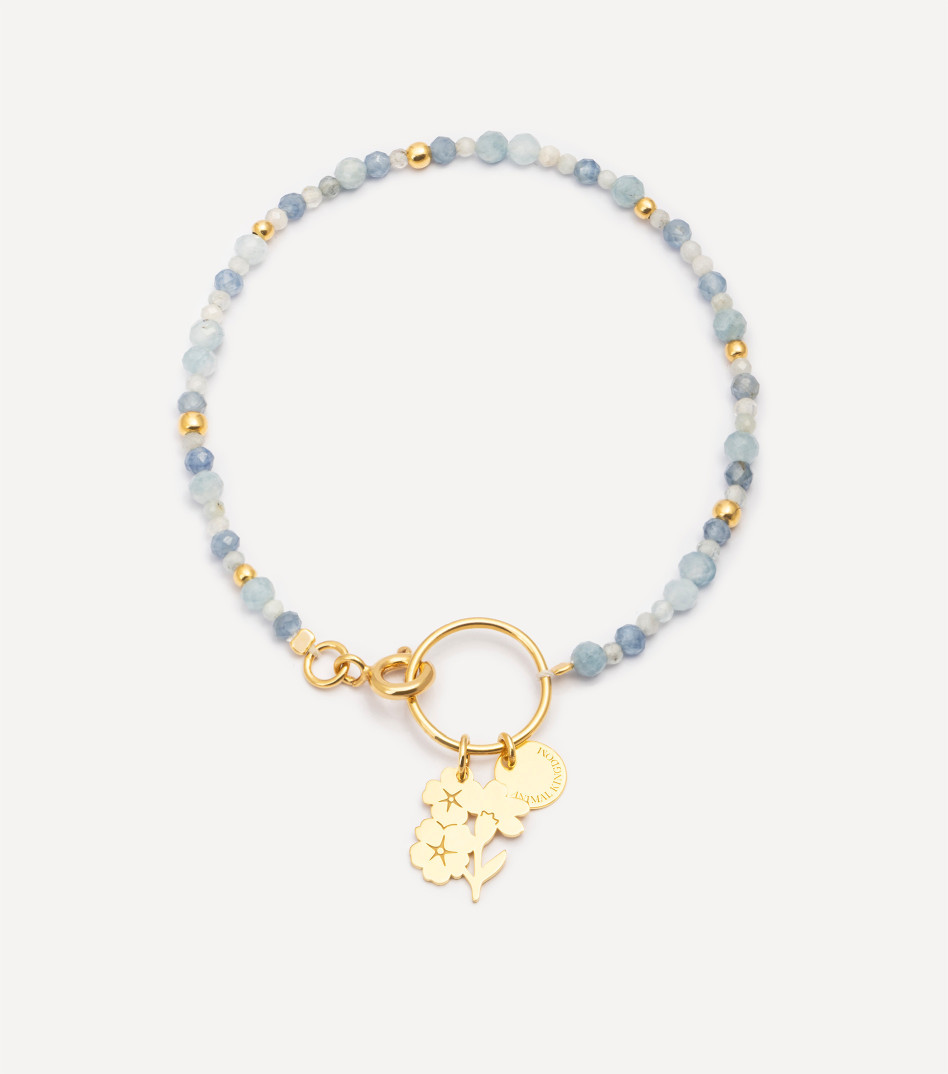 Pozłacana bransoletka z kamieniami i zawieszką