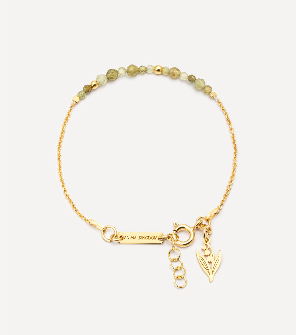 Pozłacana bransoletka z kamieniami i łańcuszkiem