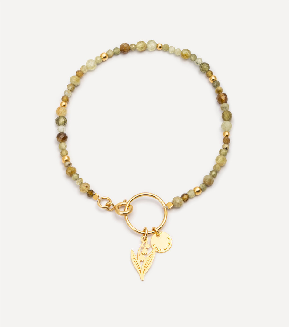 Pozłacana bransoletka z kamieniami i zawieszką