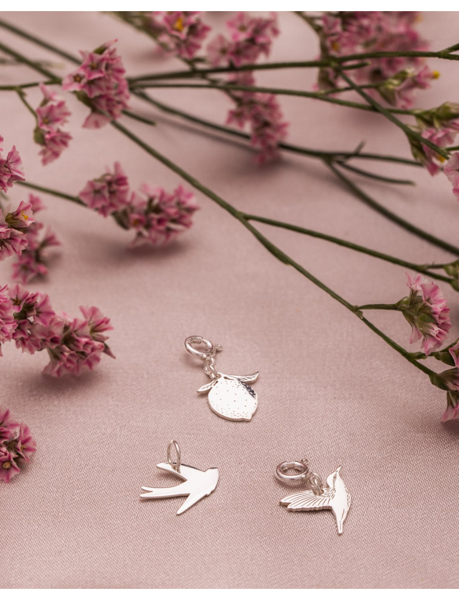 Be Natural silver charm