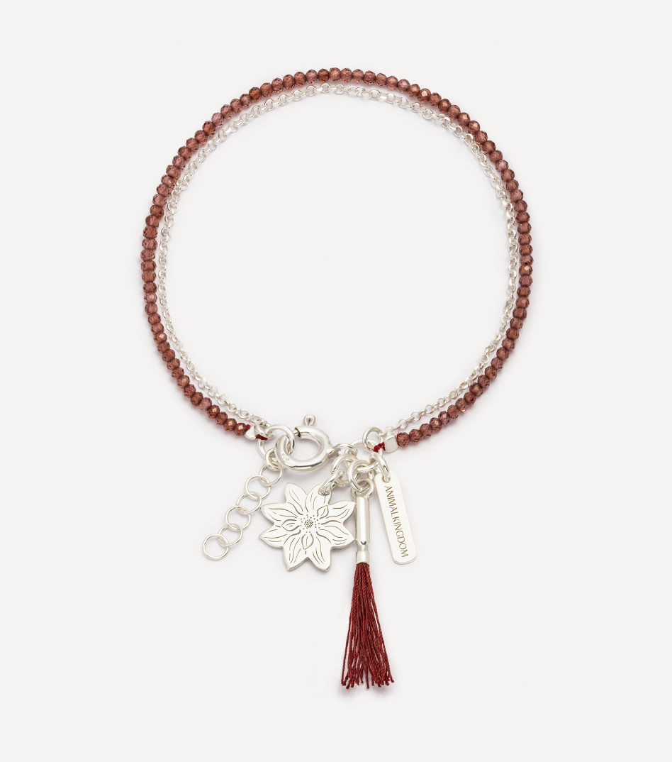 Srebrna bransoletka z kamieniami i zawieszką